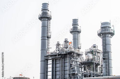 Industrial zone,The equipment of oil refining,Close-up of industrial pipelines of an oil-refinery plant,Detail of oil pipeline with valves in large oil refinery.