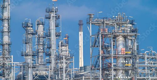 Industrial zone,The equipment of oil refining,Close-up of industrial pipelines of an oil-refinery plant,Detail of oil pipeline with valves in large oil refinery.