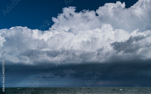 Dramatic clouds threatening storm over beautiful blue seascape © R Kevin Collins