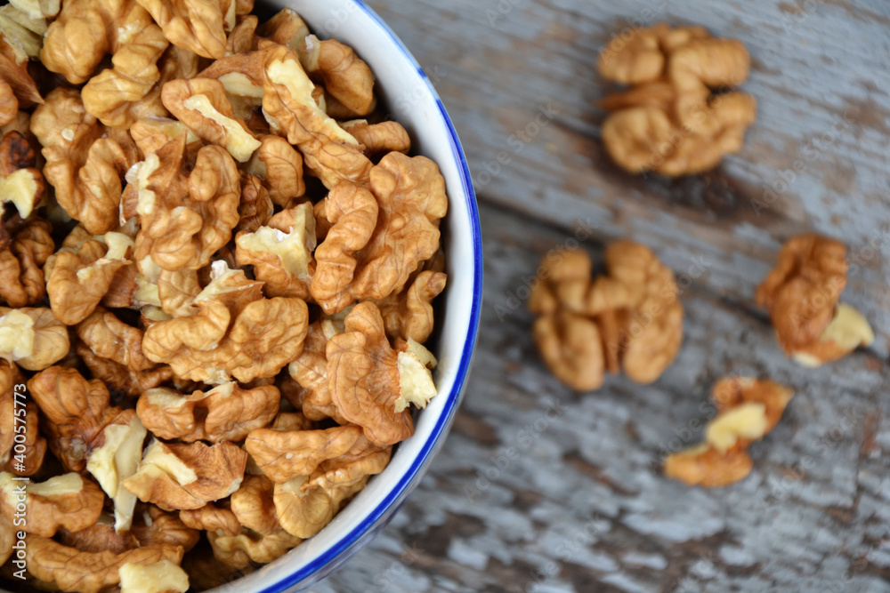Walnut nuts clean fresh organic walnuts blue wooden background 3 Walnut nuts clean fresh organic walnuts blue wooden background 3