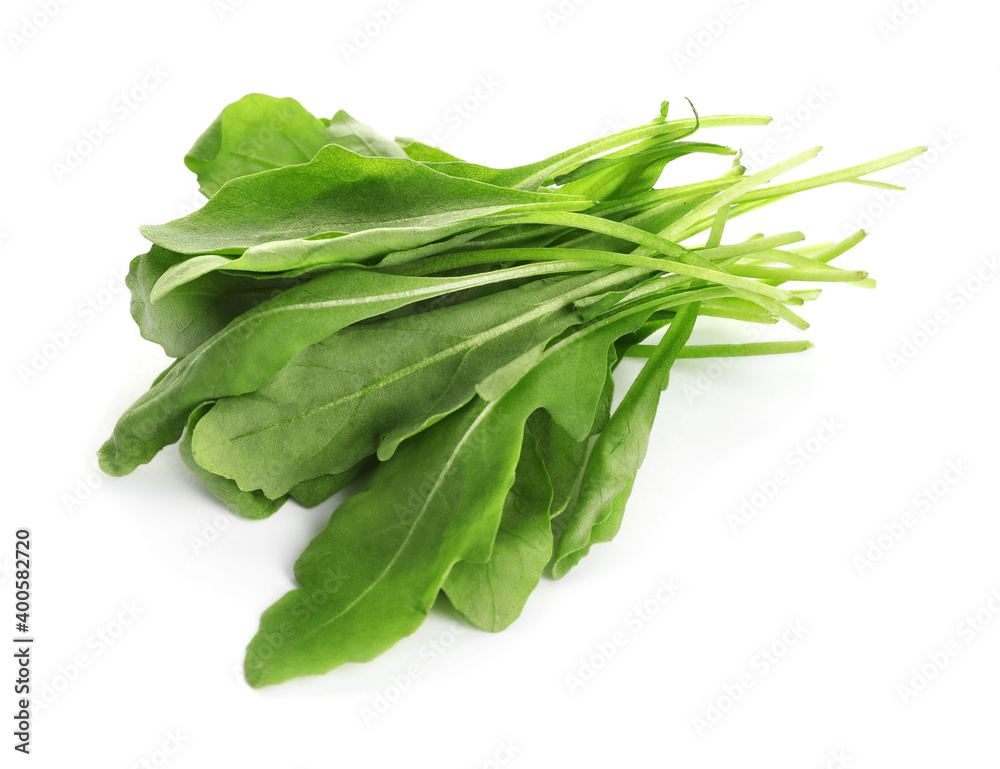 Fresh green arugula leaves on white background Fresh green arugula leaves on white background