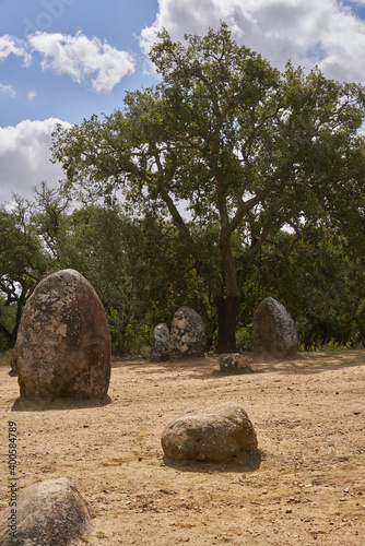 Cromlech of Almendres megalithic stone complex with cork trees in Alentejo, Portugal