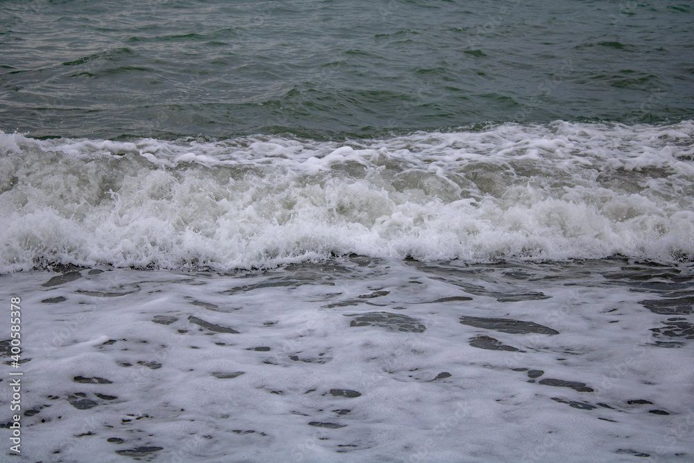 The choppy Black Sea before a storm, Sochi on a warm, cloudy summer day. The choppy Black Sea before a storm, Sochi on a warm, cloudy summer day.
