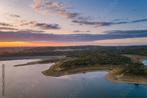 Drone panoramic aerial view of Minutos Dam in Arraiolos Alentejo at sunset, Portugal © Luis