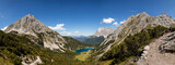 Panorama of high mountain lake Seebensee, Zugspitze mountain in Tyrol, Austria