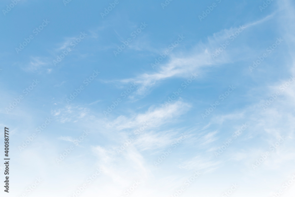 Summer Blue Sky and white clouds background. Beautiful clear cloudy in sunlight spring season. vivid cyan cloudscape in nature environment. Outdoor horizon skyline with spring sunshine.
