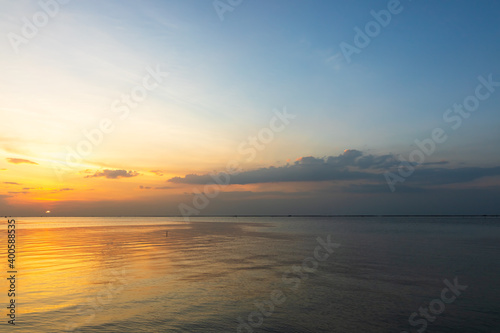 Tropical sea and beautiful sunset. Beach background travel concept.