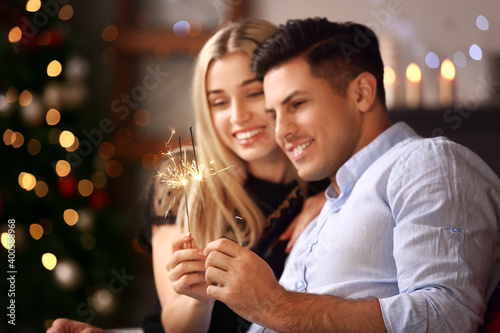 Happy young couple with spa...