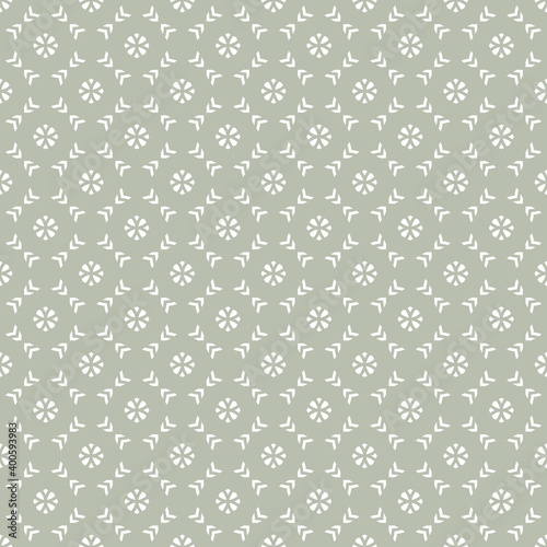 Vector geometric floral seamless pattern. Simple ornament with flower silhouettes, diamonds shapes, grid. Abstract ornamental background in light green color. Retro vintage style. Repeated design