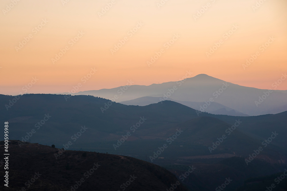 golden sunset light over the mountains