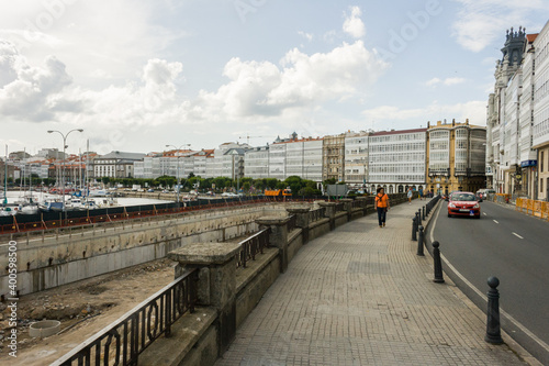 Traditional white wooden glazed wimndows in the main street in A Coruna, Galicia, Spain. photo