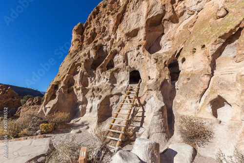 View of Bandelier National Monument near Los Alamos, New Mexico. The monument preserves the homes and territory of the Ancestral Puebloans, most of the pueblo structures dating between 1150-1600 AD. photo