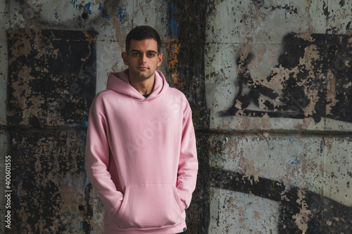 young man in casual style on the city street