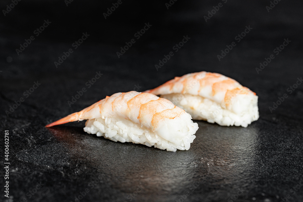 Sushi Rolls. Sushi Rolls Set, maki, philadelphia and california rolls, on a Black background. Sushi Rolls. Sushi Rolls Set, maki, philadelphia and california rolls, on a Black background.