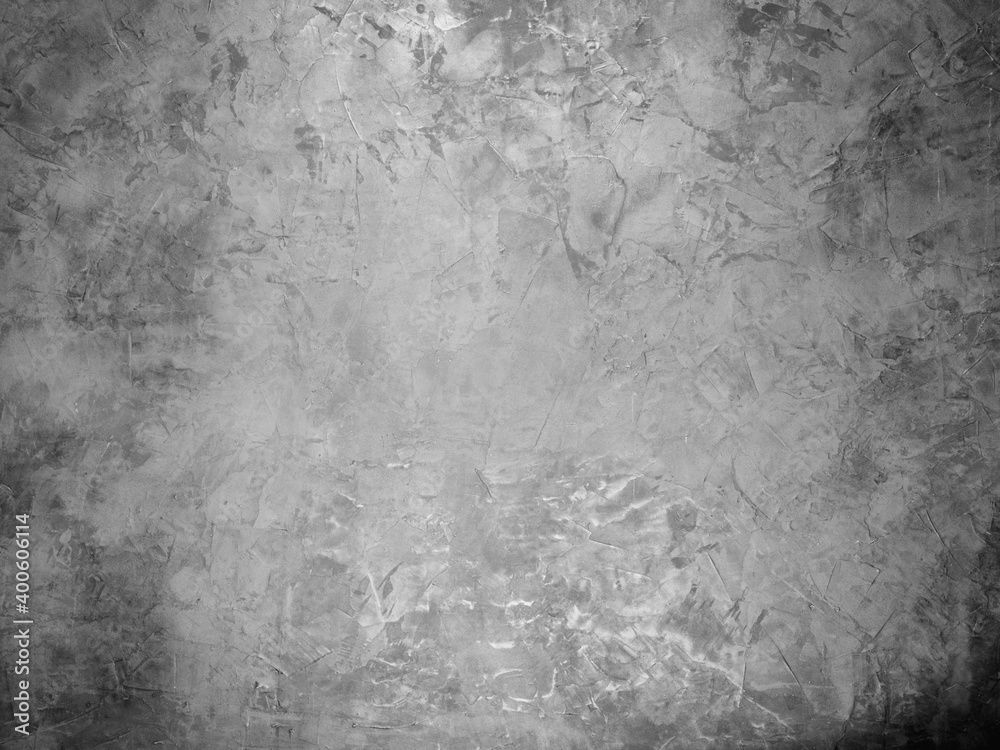 background - embossed gray wall in light and dark spots and stains, with highlights