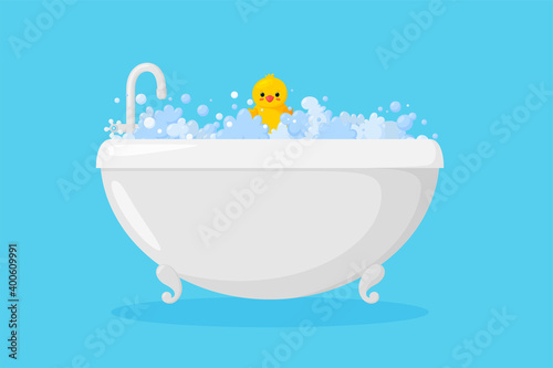 Bathtub with rubber duck in suds. Yellow duck in bubbles and foam isolated in blue background. Vector illustration in cartoon style