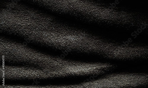 Schwarzes Leder mit Falten