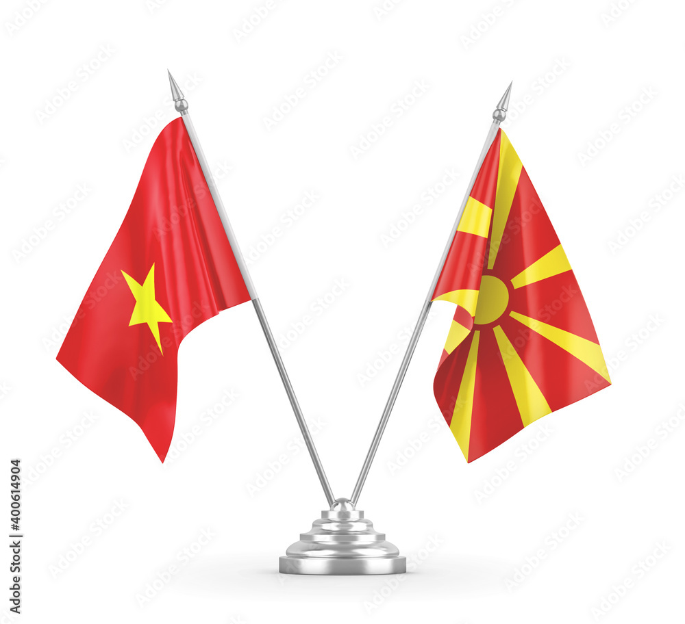 North Macedonia and Vietnam table flags isolated on white 3D rendering North Macedonia and Vietnam table flags isolated on white 3D rendering