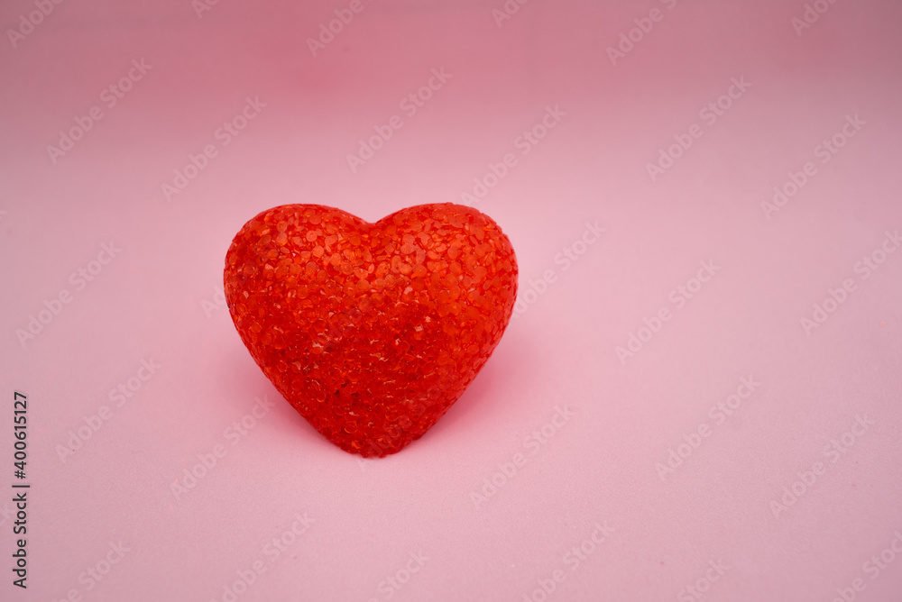 Red heart made of acrylic on a pink background. Lamp heart Red heart made of acrylic on a pink background. Lamp heart