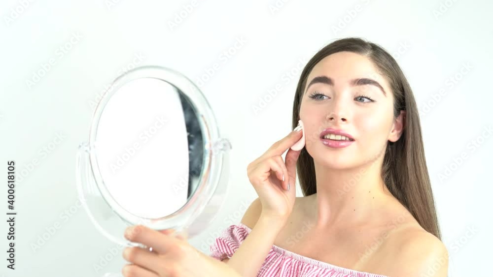Cotton pad model woman face, cosmetology remover makeup, clear. Beautiful blonde woman removing makeup from her face skin Cotton pad model woman face, cosmetology remover makeup, clear. Beautiful blonde woman removing makeup from her face skin