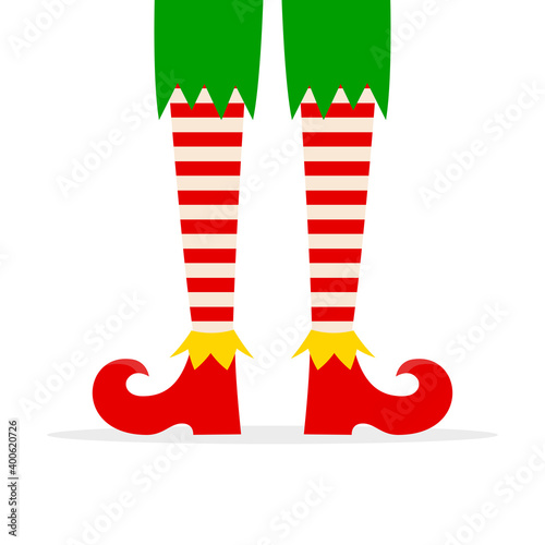 Elf legs in red shoes isolated on white background.