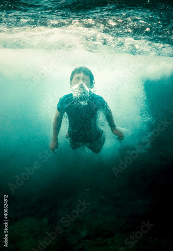 Wallpaper Mural Boy swimming underwater Torontodigital.ca
