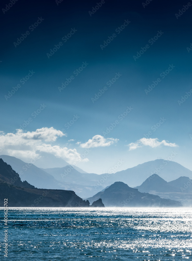 Blue sea with mountains