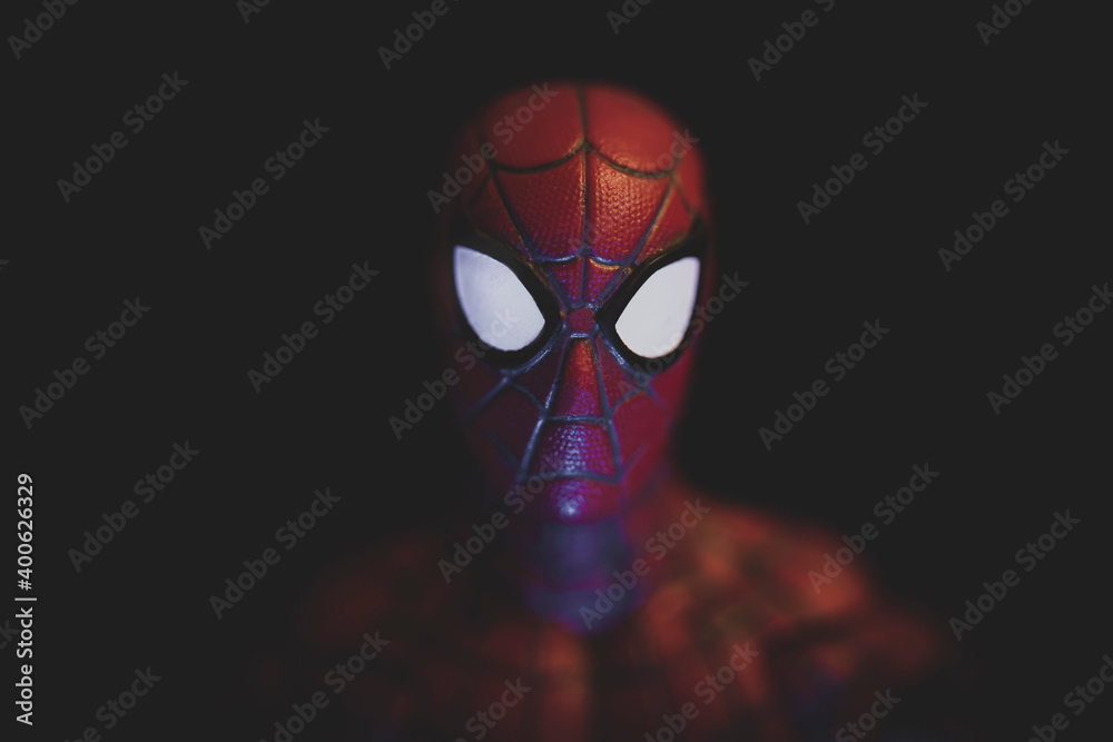 Naklejka premium NEW YORK USA, DEC 20 2020: Spiderman portrait with dramatic lighting - Hasbro Action Figure