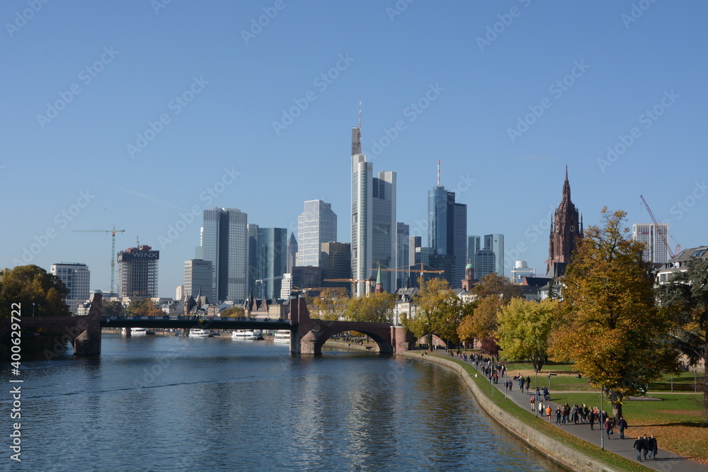 Panoramic view on Frankfurts Skyline, seen from a bridge over the river Main, Frankfurt, Germany Panoramic view on Frankfurts Skyline, seen from a bridge over the river Main, Frankfurt, Germany