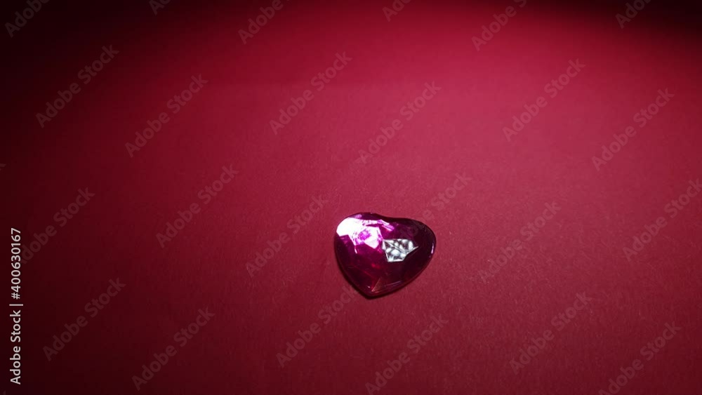 decorative heart on a red background, highlights are reflected in the decoration, congratulations on valentine's day decorative heart on a red background, highlights are reflected in the decoration, congratulations on valentine's day