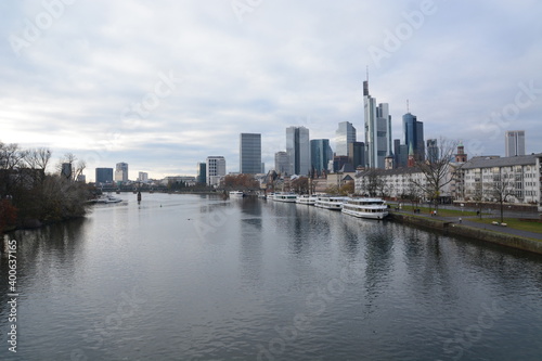 Fototapeta Naklejka Na Ścianę i Meble -  View on Frankfurts Skyline, seen from a bridge over the river Main