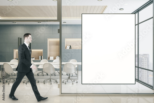 Businessman walking in conference room