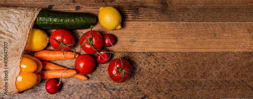 fresh ingredients of Mediterranean salad: Cucumber, tomato, lemon, carrot, pepper and radish
