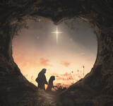 Christmas religious nativity concept: Silhouette mother Mary and father Joseph looking Jesus born in birth manger on Christmas Eve - 3d illustration
