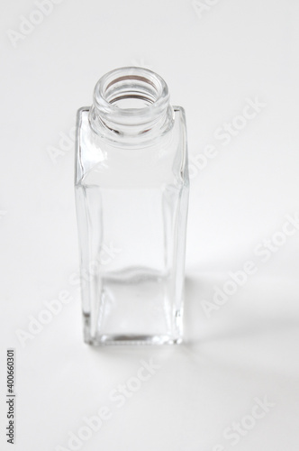 clean glass bottle isolated on white background