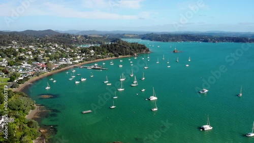 Aerial orbit reveal beautiful scenery of Bay of Islands. Summer day in Russell, New Zealand. Good colorful light. photo