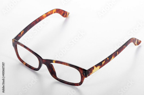 A close-up picture of a hawksbill turtle glasses frame on a white background