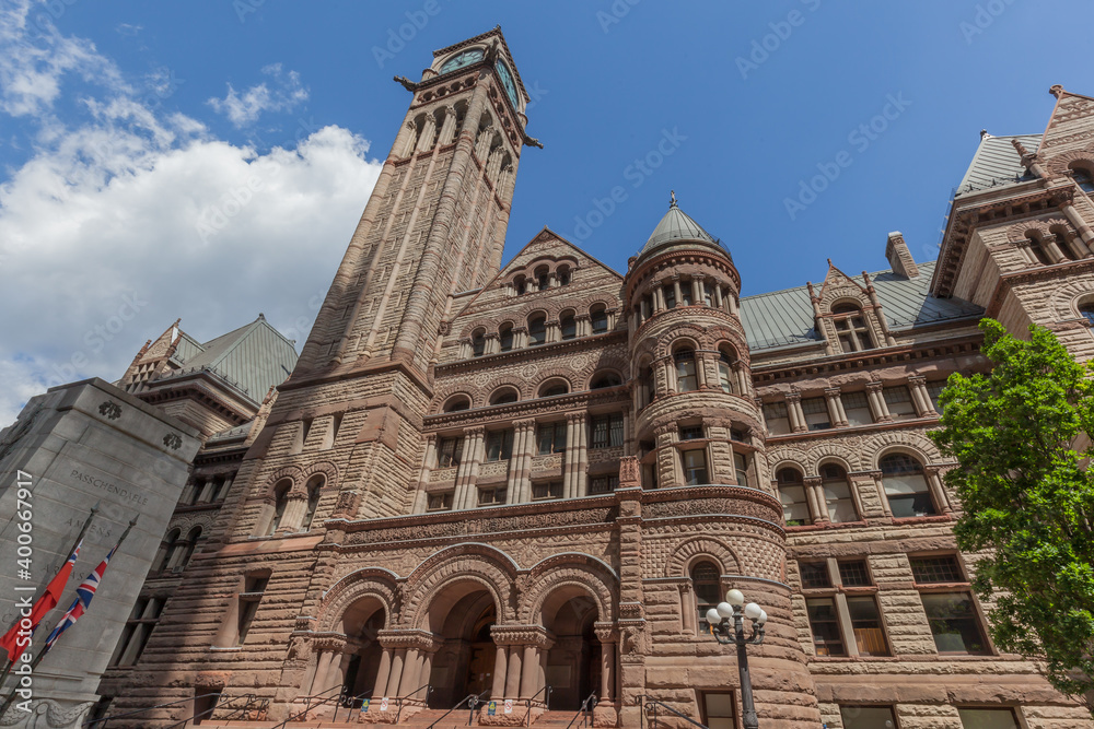 TORONTO,CANADA - JUNE 25, 2017: Front view of old city hall. Old city hall was the home of the Toronto City Council from 1899 to 1966 and remains one of the city's most famous structures.