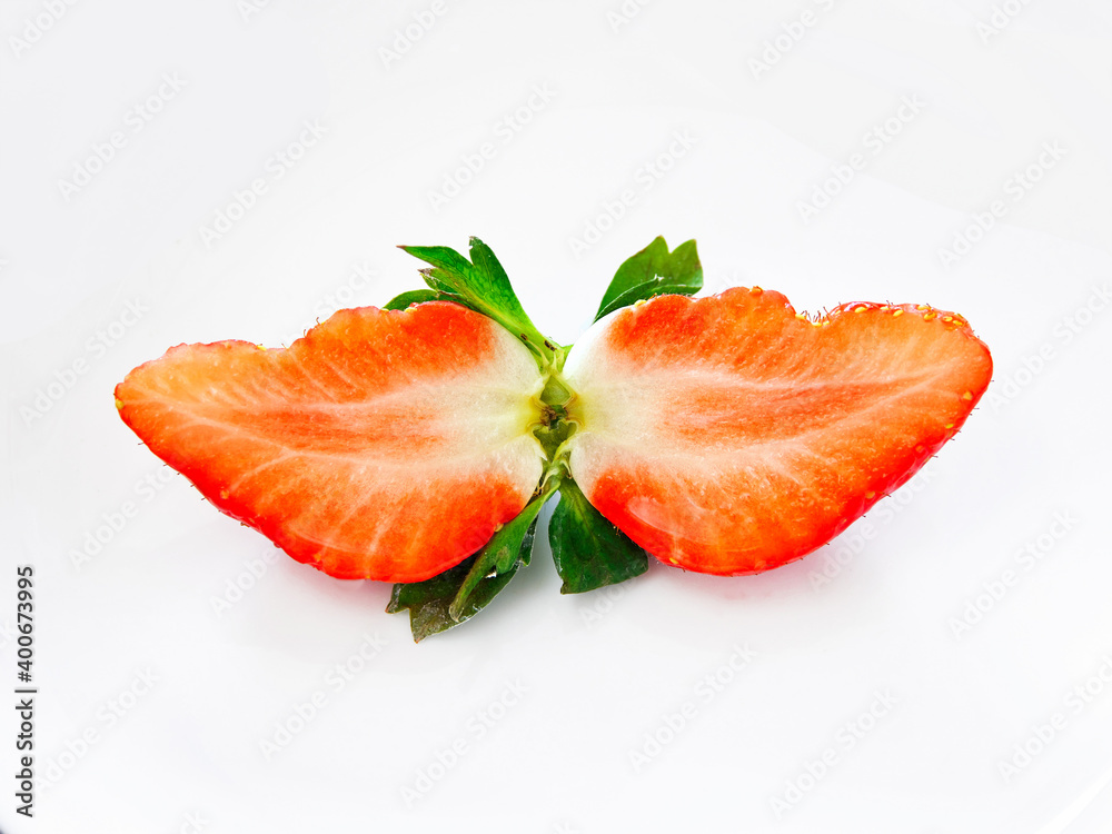 2020: Fresh and juicy sliced strawberry on white background
2020: Fresh and juicy sliced strawberry on white background