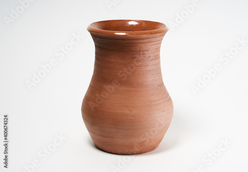 Pottery Craft, ceramic product with your own hands, made on a Potter's wheel, isolated on a white background.