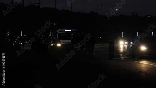 A police car flashing lights in the nights photo