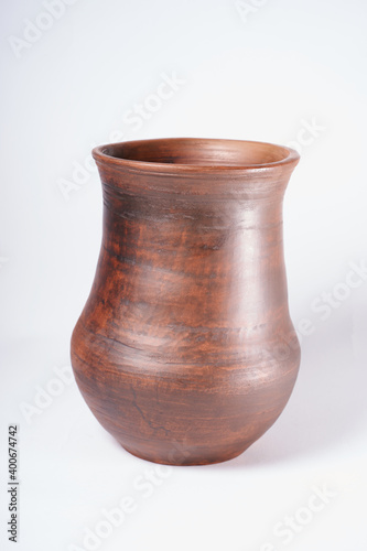 Pottery Craft, ceramic product with your own hands, made on a Potter's wheel, isolated on a white background.