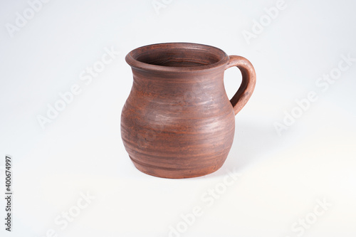 Pottery Craft, ceramic product with your own hands, made on a Potter's wheel, isolated on a white background.