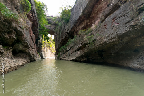 gorge narrows on the river. A bridge is visible ahead