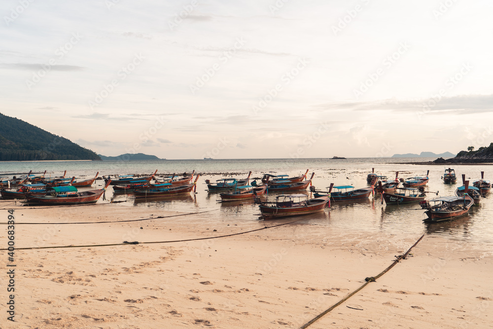 The beach in the morning on Koh Lipe and Long tail boat in the morning The beach in the morning on Koh Lipe and Long tail boat in the morning