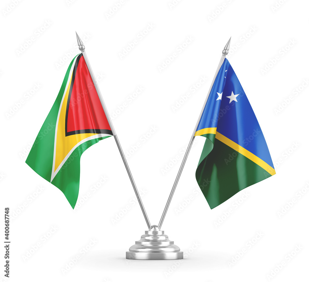 Solomon Islands and Guyana table flags isolated on white 3D rendering Solomon Islands and Guyana table flags isolated on white 3D rendering