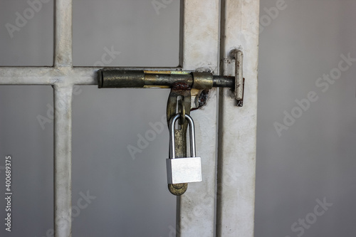 close up locks iron door or steel door in building to prevent thieves.
