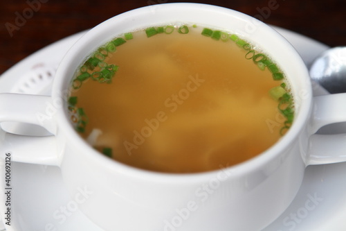 Beef consomme with pancake julienne