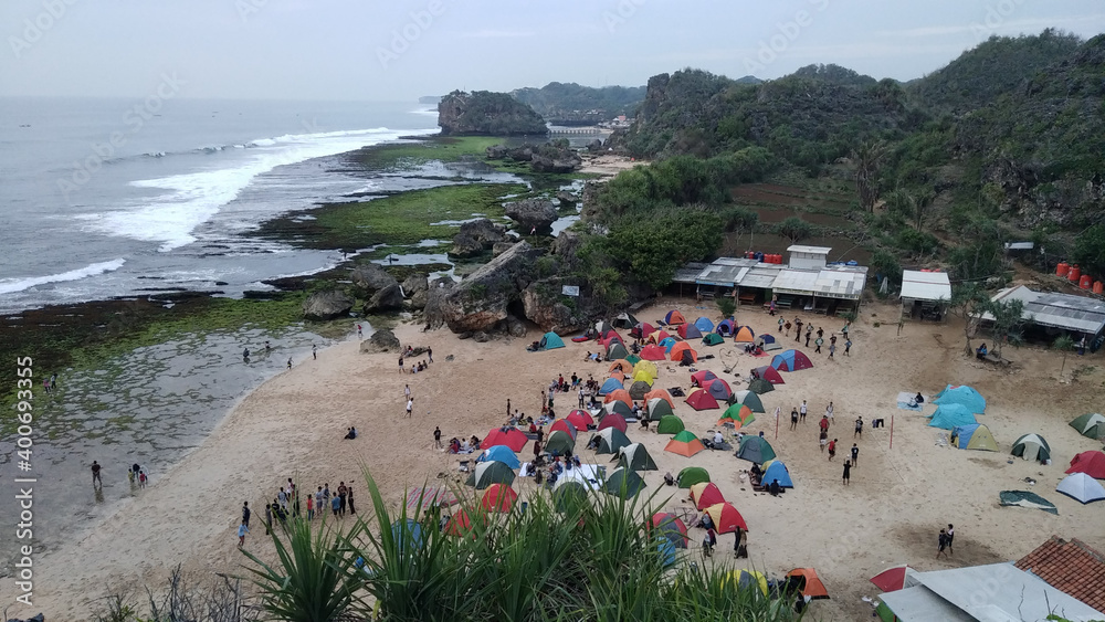 Colorful tents at camping site in the beach of Indian Ocean in Gunungkidul, Jogjakarta, Indonesia