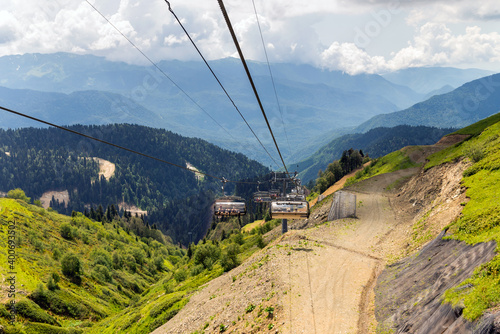 Chairlift in a mountain region in summer. Life of ski resort in summertime